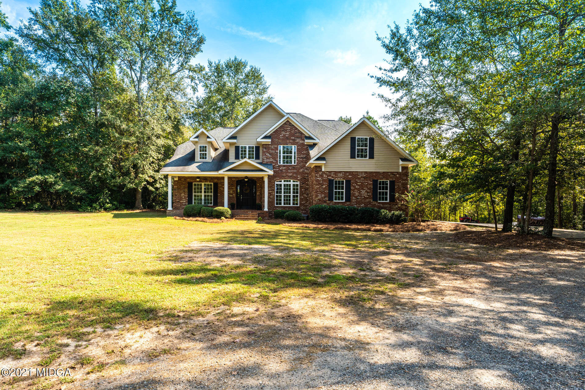 3368 Tidwell Road Lizella, GA 31052 - Photo 5 of 43 a front view of a house with a ocean view