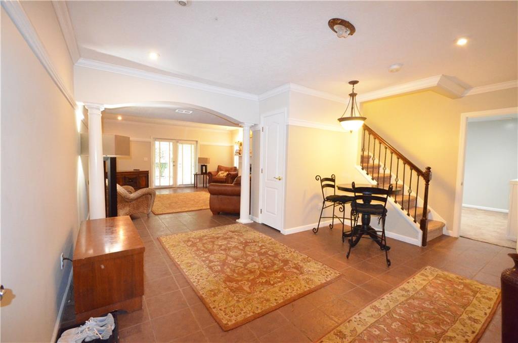 603 Heritage Place Cranberry Township, PA 16066 - Photo 20 of 25 a living room with fireplace furniture and a table