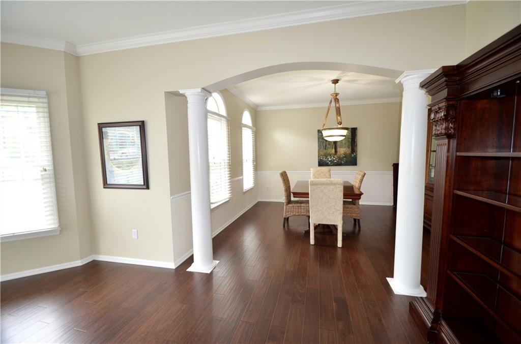 603 Heritage Place Cranberry Township, PA 16066 - Photo 4 of 25 a view of a dining room with furniture window and wooden floor