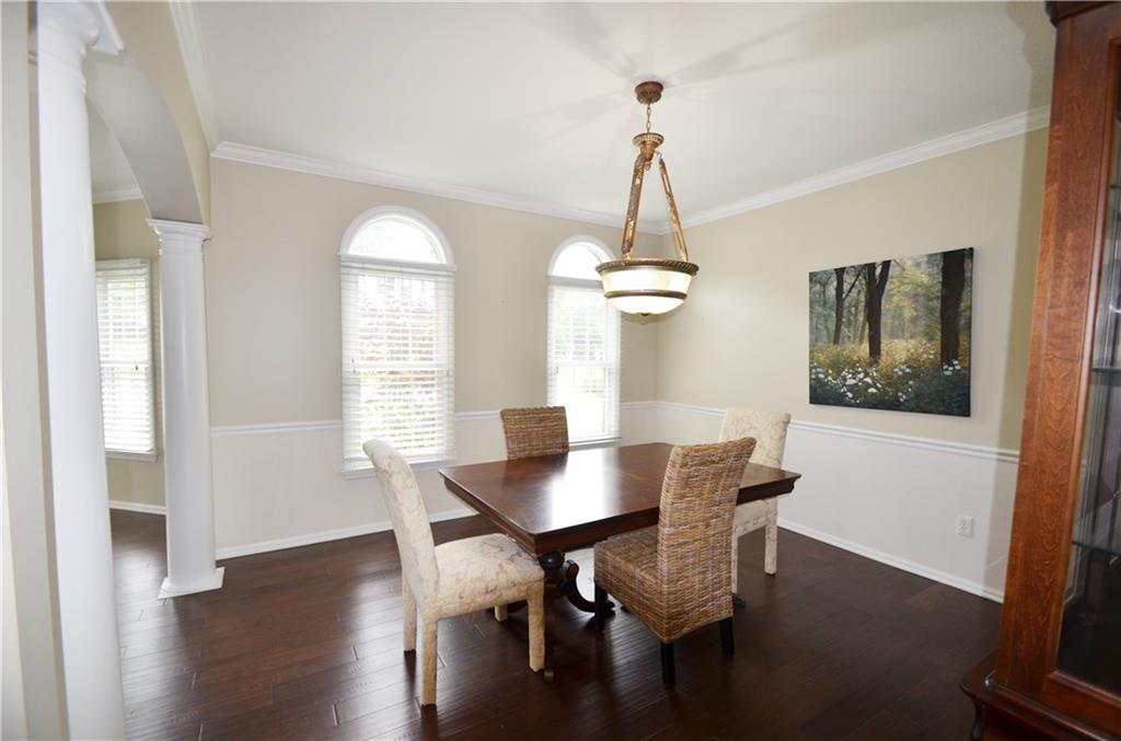603 Heritage Place Cranberry Township, PA 16066 - Photo 5 of 25 a view of a dining room with furniture window and wooden floor