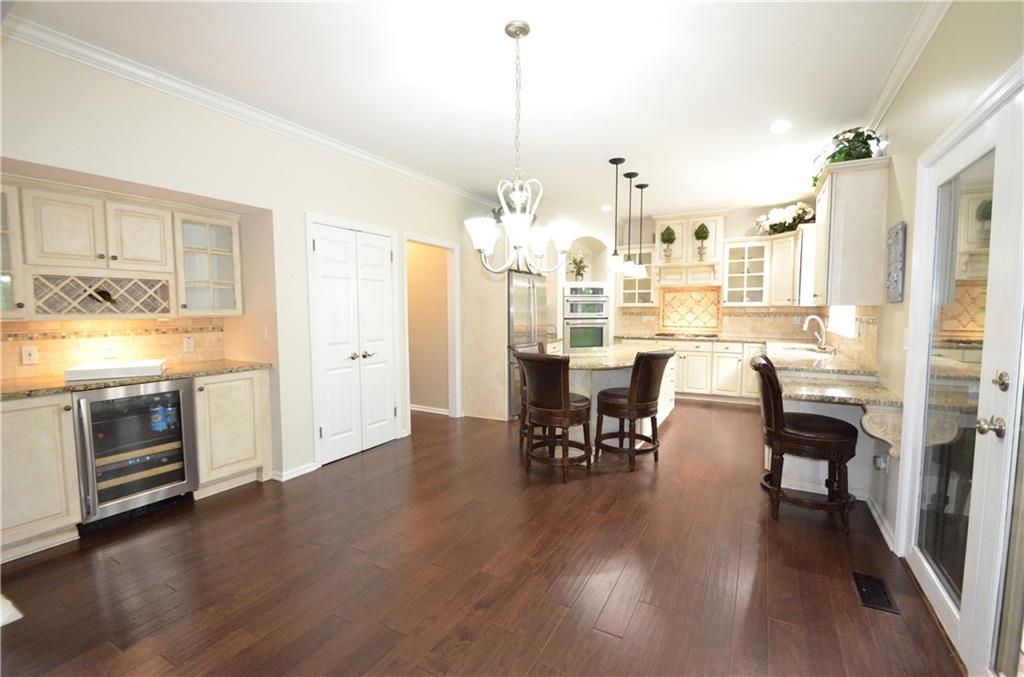 603 Heritage Place Cranberry Township, PA 16066 - Photo 6 of 25 a view of a dining room with furniture window and wooden floor