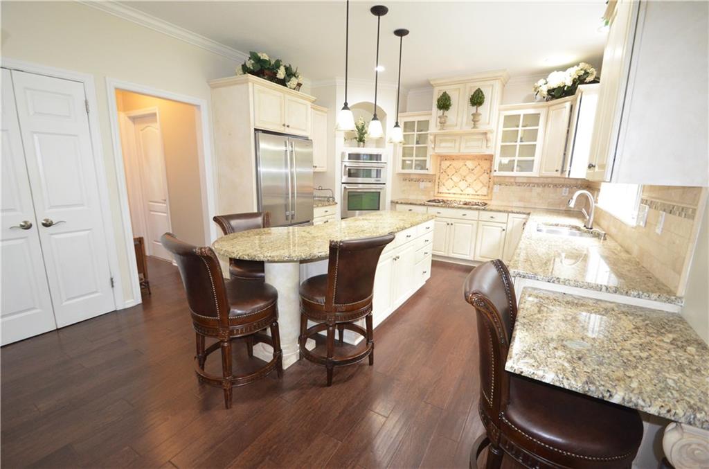 603 Heritage Place Cranberry Township, PA 16066 - Photo 9 of 25 a view of a dining room with furniture window and wooden floor