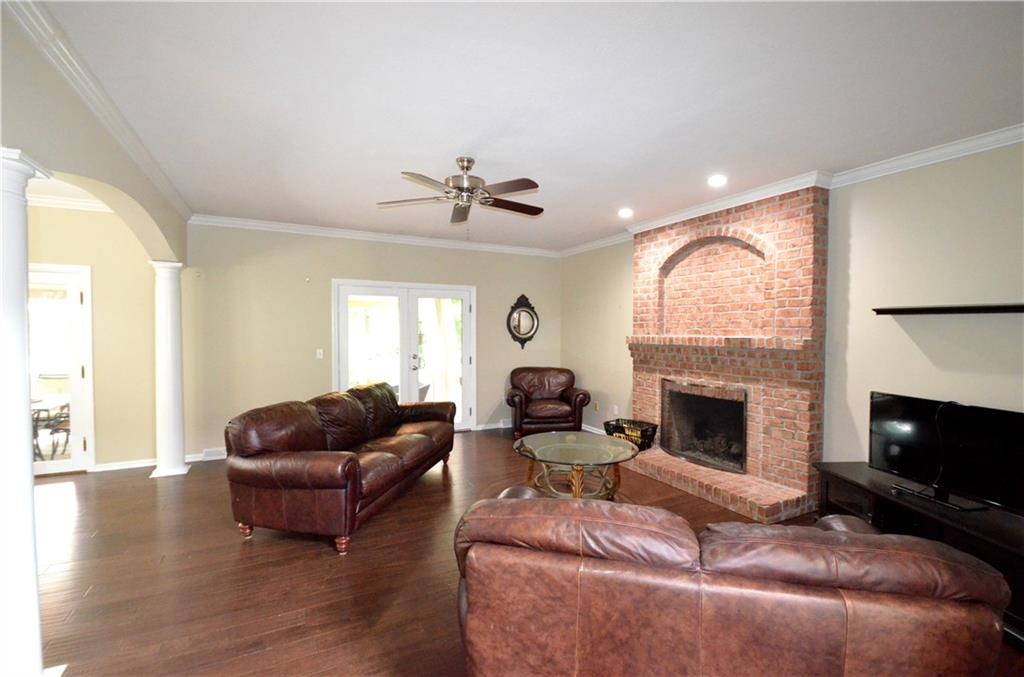 603 Heritage Place Cranberry Township, PA 16066 - Photo 10 of 25 a living room with furniture flat screen tv and a fireplace