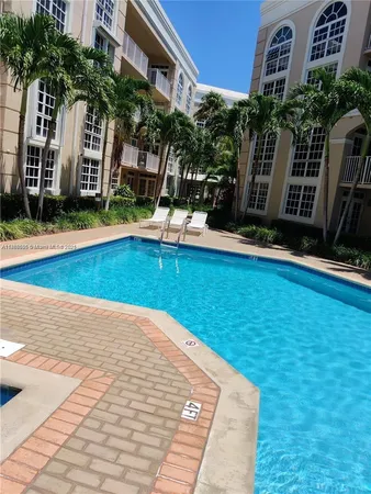 a view of a house with swimming pool