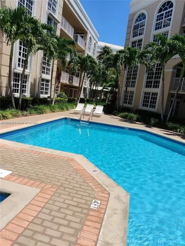 a view of a house with swimming pool