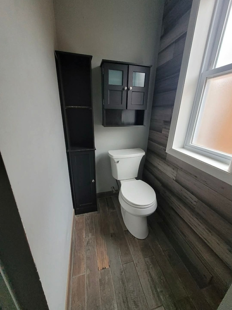 1630 Home Avenue, Unit 2 Berwyn, IL 60402 - Photo 5 of 7 a bathroom with a toilet and a shower