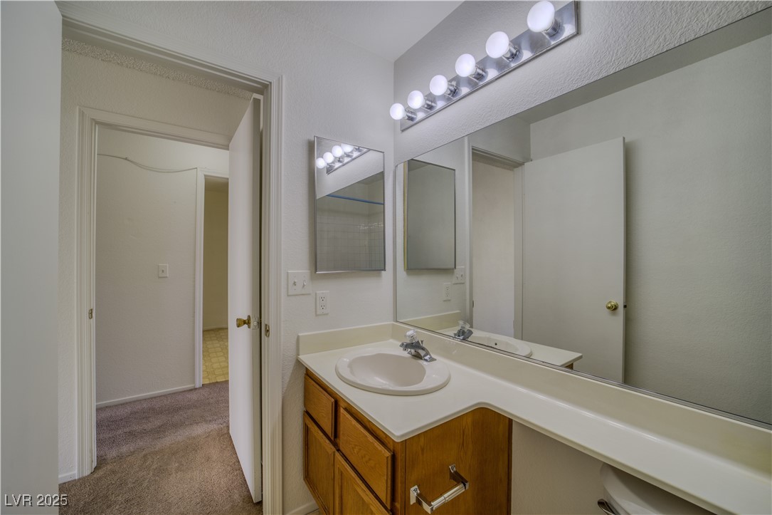 2232 Aspen Mirror Way, Unit 202 Laughlin, NV 89029 - Photo 24 of 39 Bathroom featuring vanity and baseboards