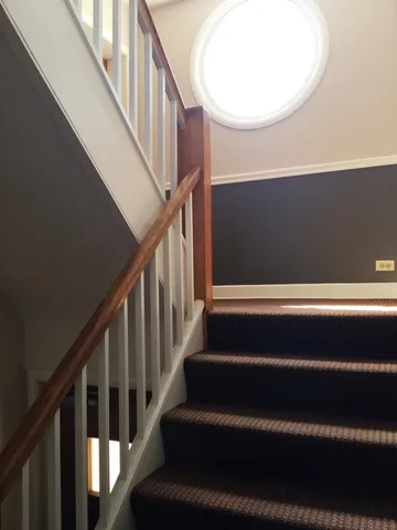 a view of stairs and an entryway