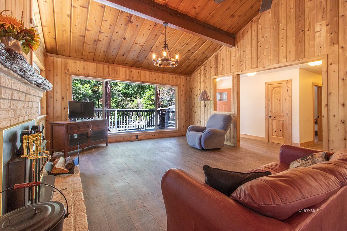 25104 Fern Valley Road Idyllwild, CA 92549 - Photo 17 of 55 a living room with furniture a large window with outer view