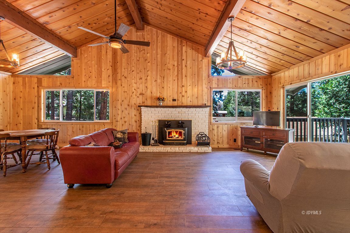 25104 Fern Valley Road Idyllwild, CA 92549 - Photo 18 of 55 a living room with furniture and a fireplace