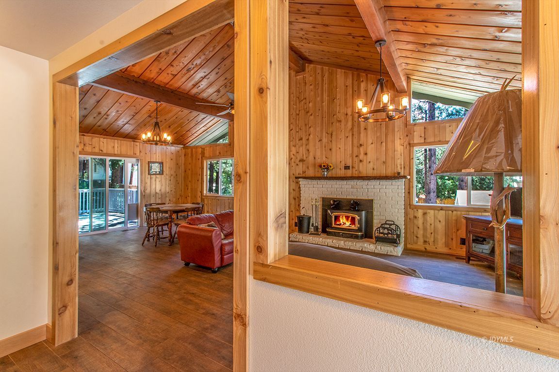 25104 Fern Valley Road Idyllwild, CA 92549 - Photo 2 of 55 a view of a livingroom with furniture and a fireplace