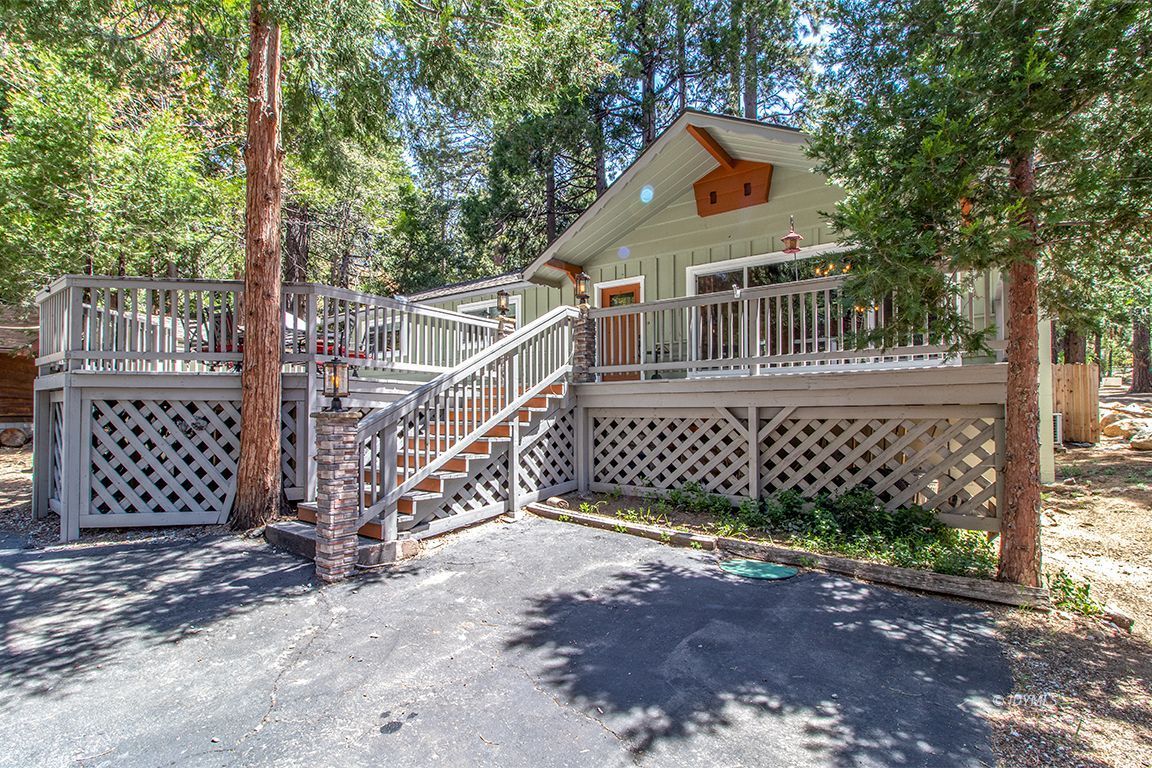 25104 Fern Valley Road Idyllwild, CA 92549 - Photo 47 of 55 a front view of a house with a yard