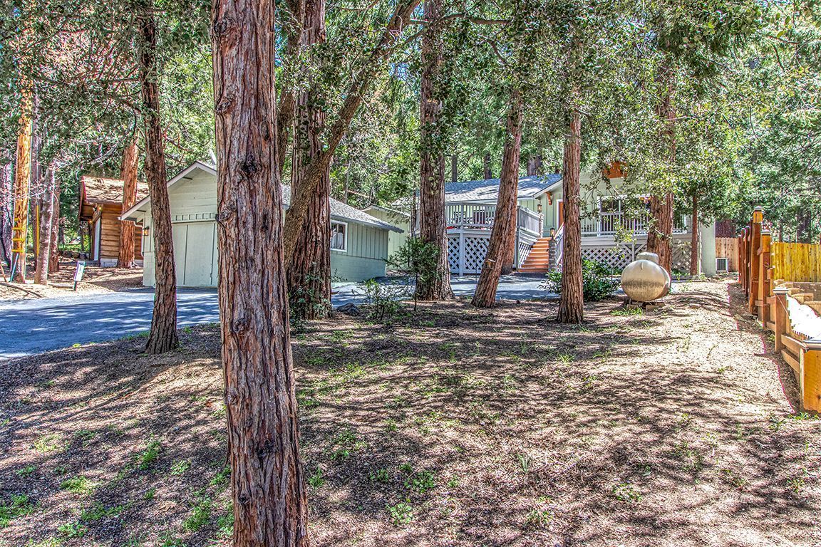 25104 Fern Valley Road Idyllwild, CA 92549 - Photo 55 of 55 a view of a house with a tree in the background