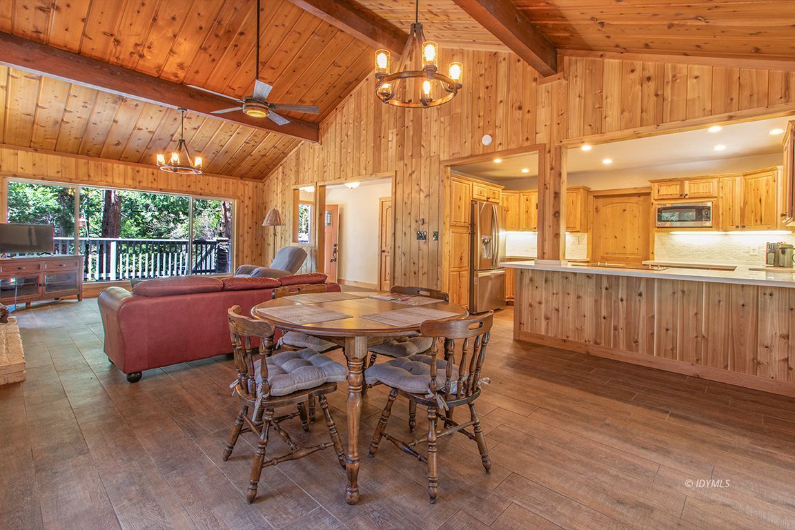 25104 Fern Valley Road Idyllwild, CA 92549 - Photo 7 of 55 a view of a patio with a table and chairs