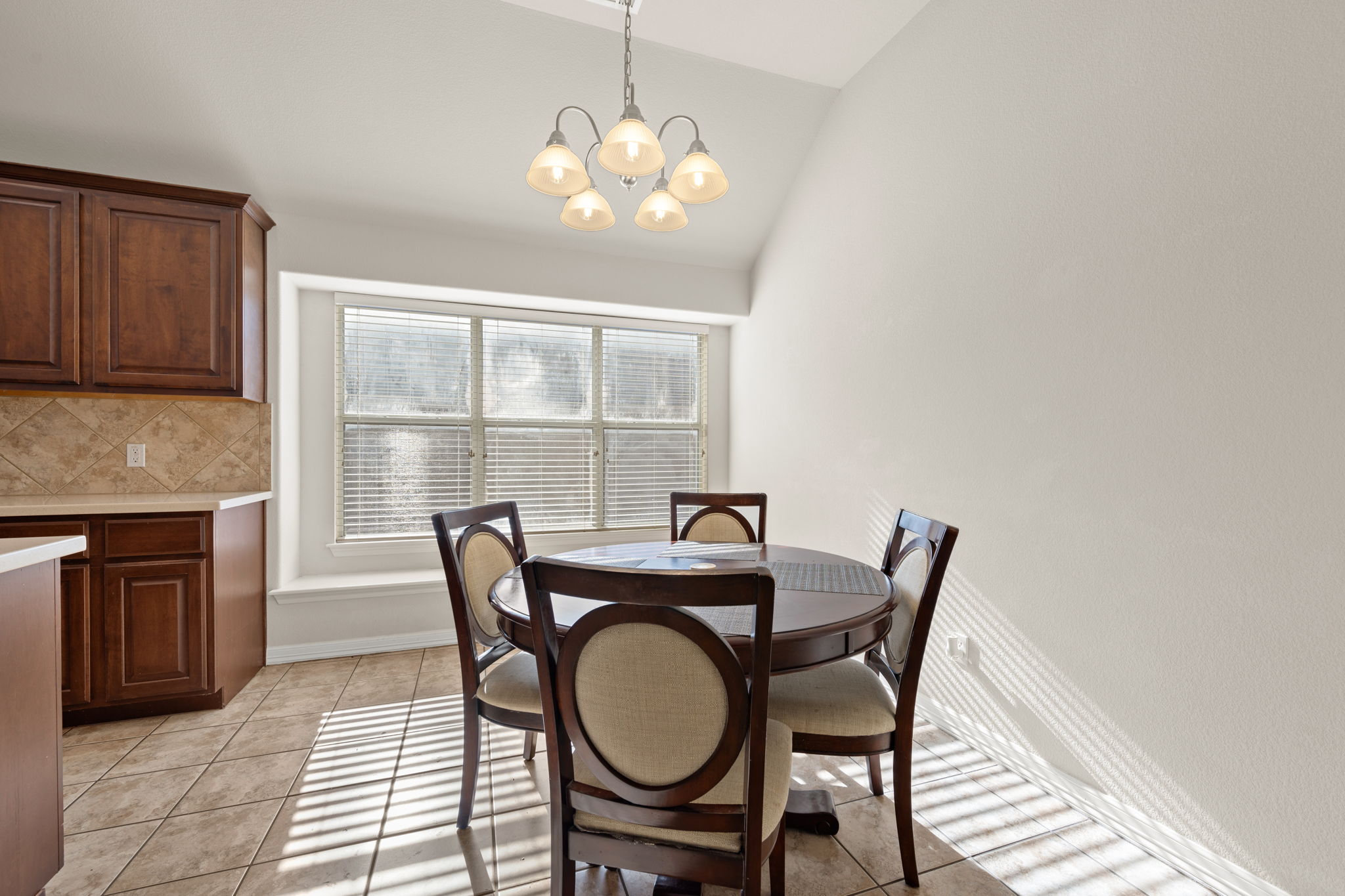 2221 Village View Loop Pflugerville, TX 78660 - Photo 11 of 25 a dining room with furniture and window