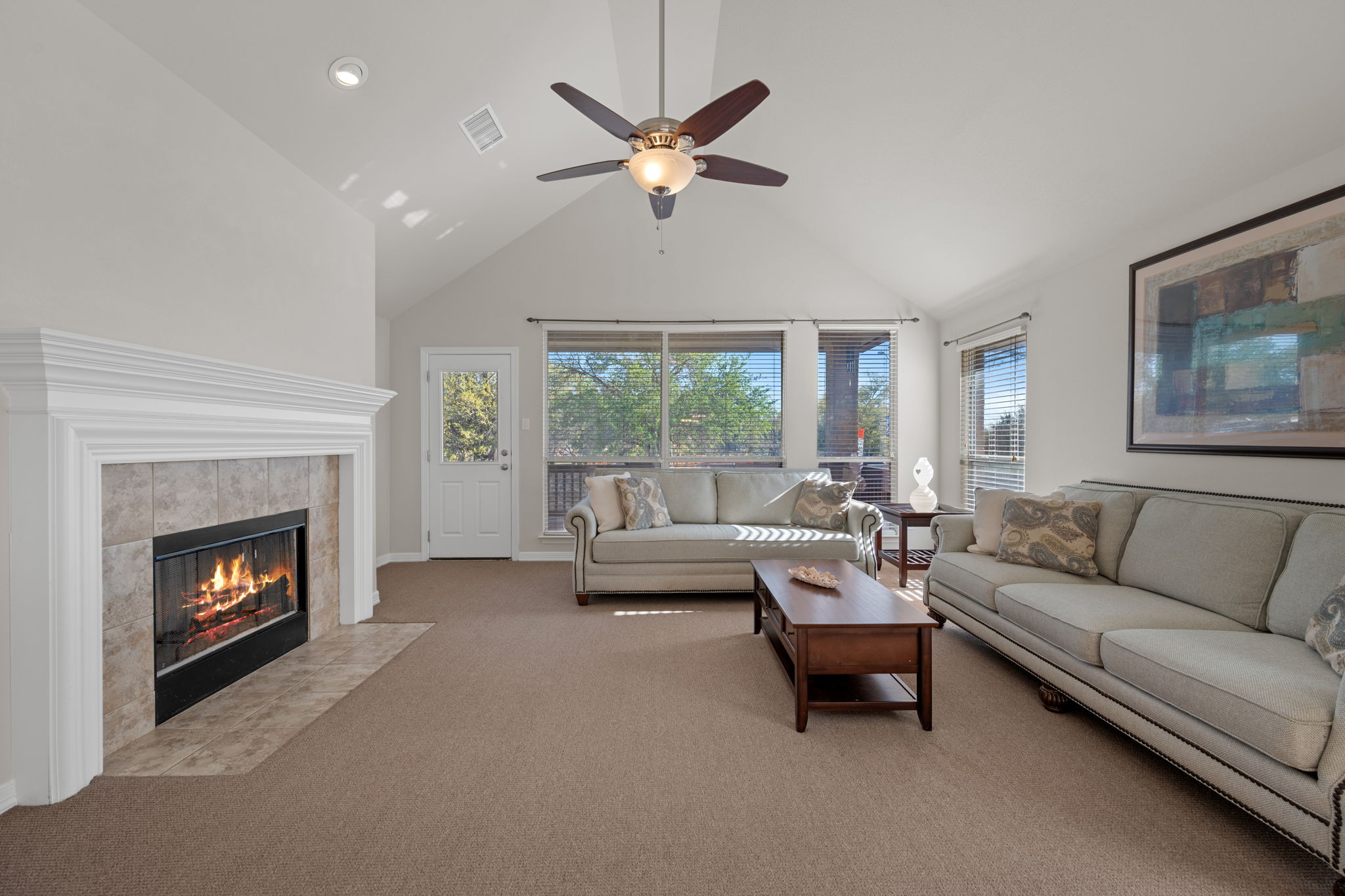 2221 Village View Loop Pflugerville, TX 78660 - Photo 13 of 25 a living room with furniture and a fireplace