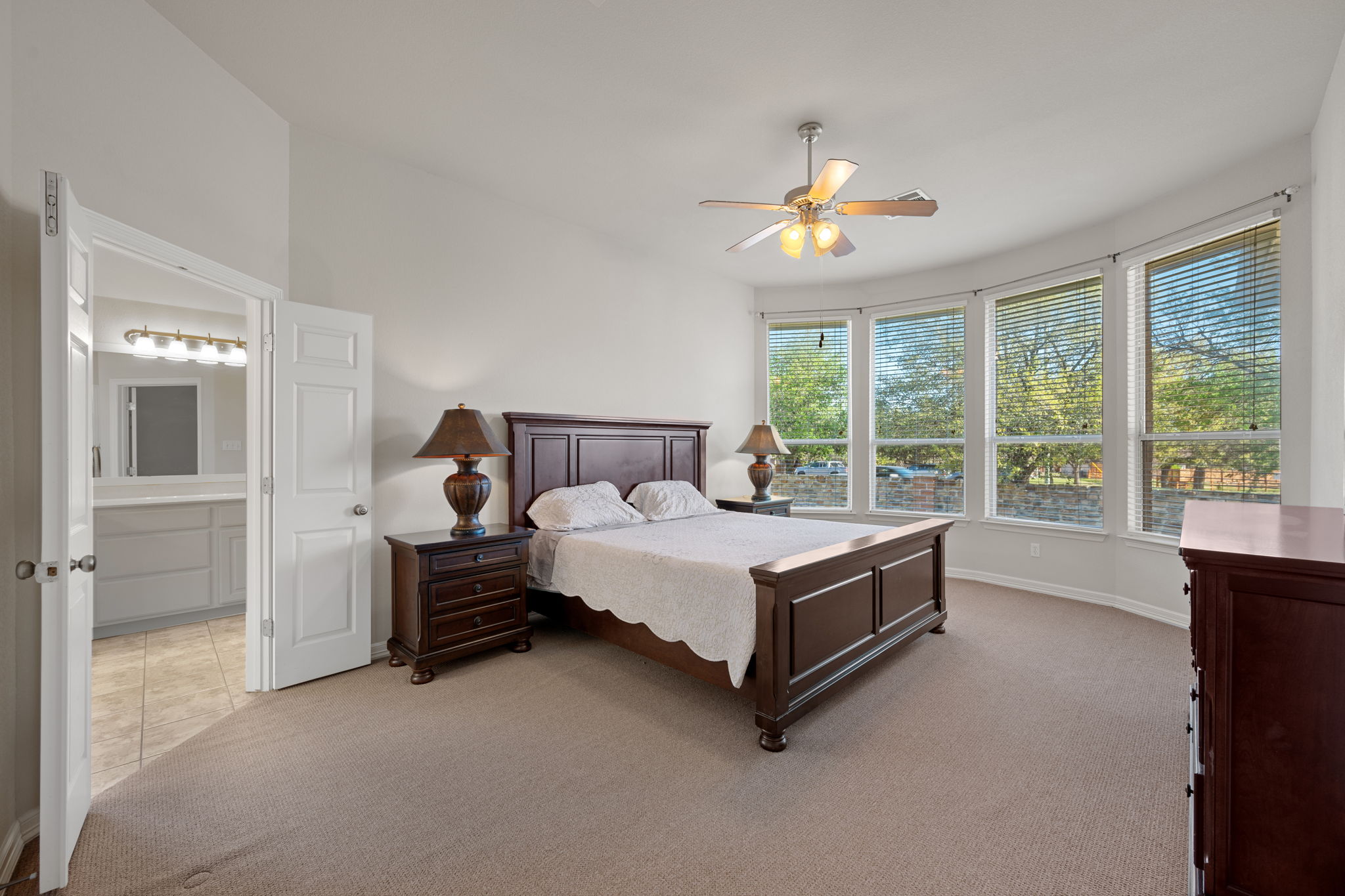 2221 Village View Loop Pflugerville, TX 78660 - Photo 14 of 25 a bed room with a bed and a window