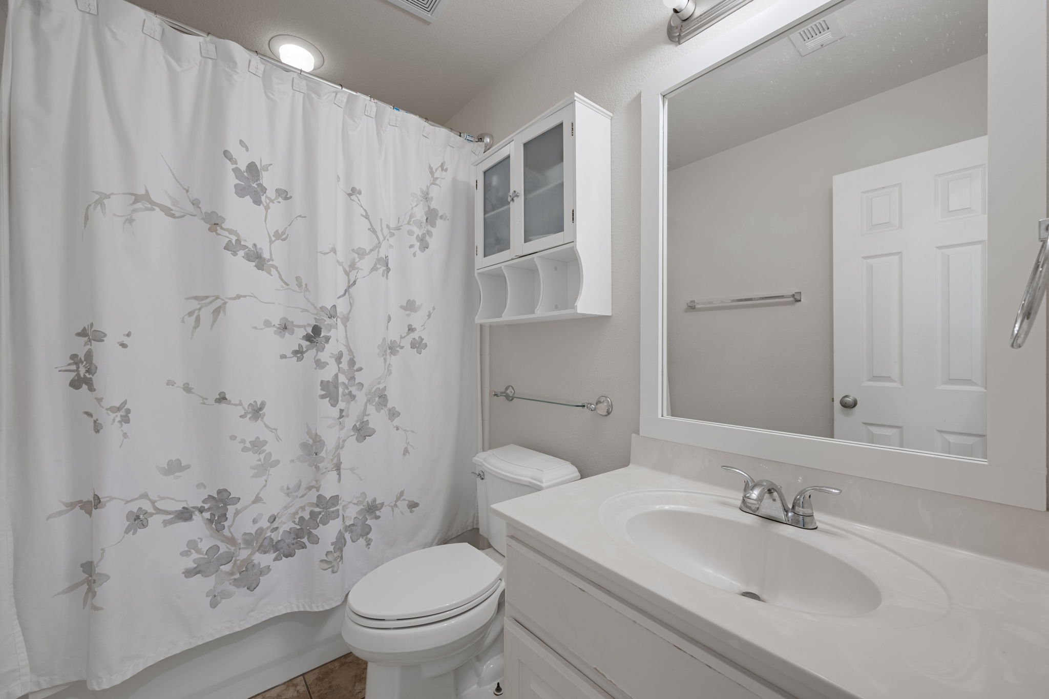 2221 Village View Loop Pflugerville, TX 78660 - Photo 17 of 25 a bathroom with a sink toilet and shower