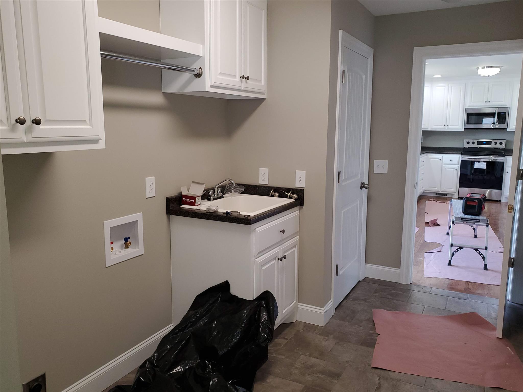 150 Morton Road Manchester, TN 37355 - Photo 14 of 17 More Storage!!! The Laundry Room includes a utility sink and overhead storage.