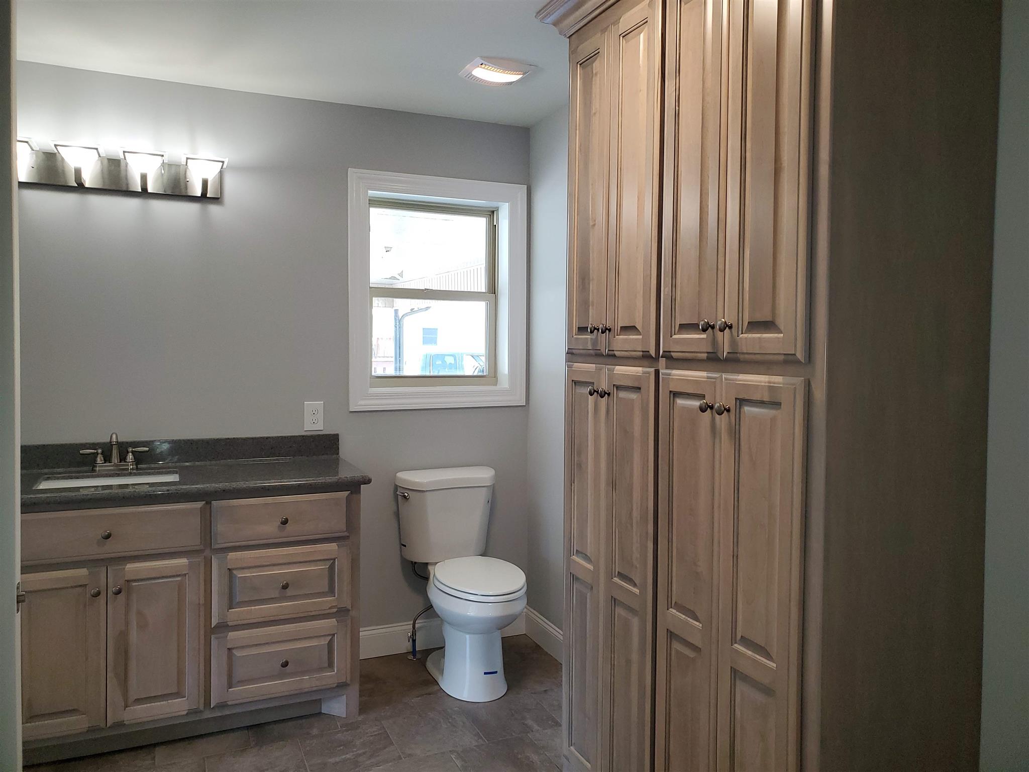 150 Morton Road Manchester, TN 37355 - Photo 6 of 17 Owner's Bath with another custom vanity and a large storage unit.