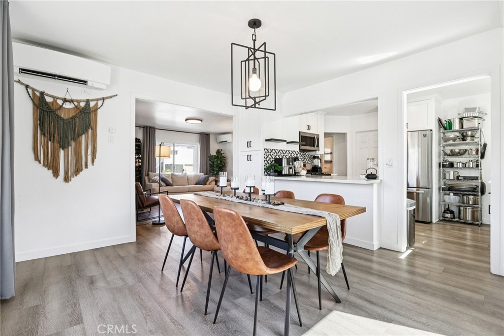 1448 Lemon Avenue Long Beach, CA 90813 - Photo 6 of 19 a view of a dining room with furniture and wooden floor