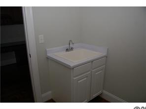 1066 Gardenia Street Fort Mill, SC 29708 - Photo 11 of 12 a bathroom with a sink and vanity