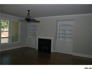 1066 Gardenia Street Fort Mill, SC 29708 - Photo 4 of 12 a living room with a fireplace