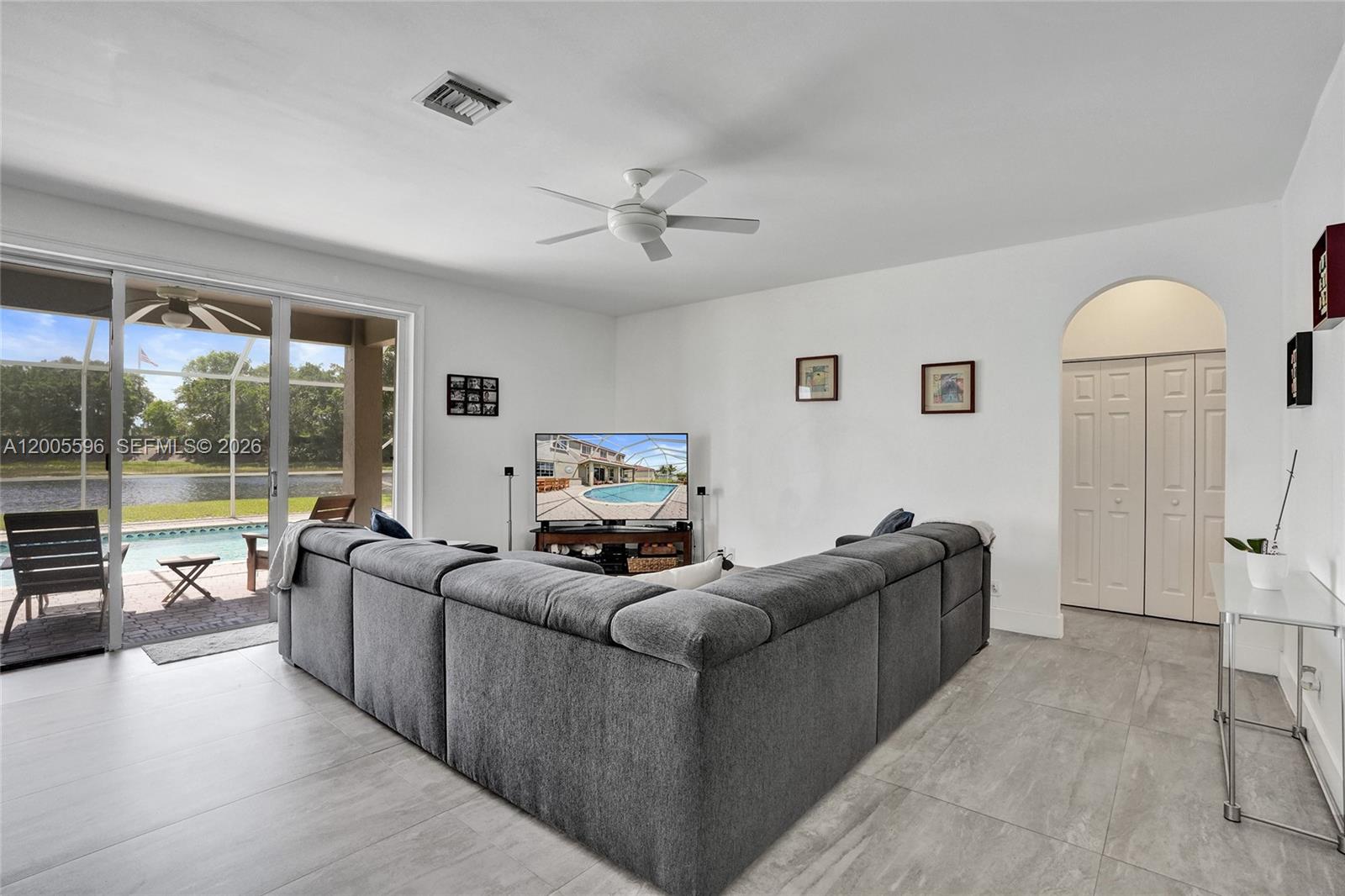 4281 Laurel Ridge Circle Weston, FL 33331 - Photo 21 of 80 a living room with furniture and a large window