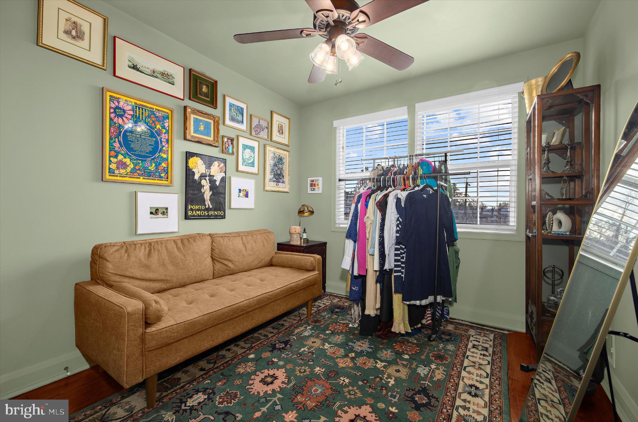 1215 Roland Heights Avenue Baltimore, MD 21211 - Photo 18 of 38 a living room with furniture and a window