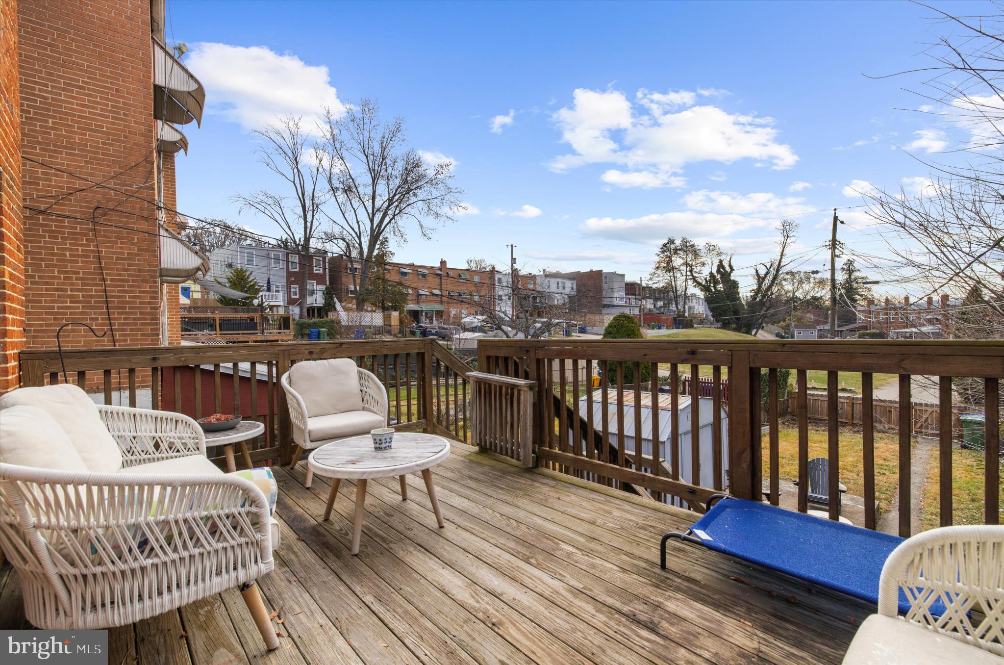1215 Roland Heights Avenue Baltimore, MD 21211 - Photo 26 of 38 a balcony with wooden floor and city view