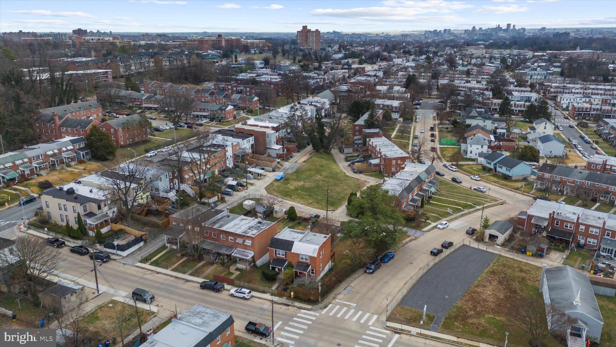 1215 Roland Heights Avenue Baltimore, MD 21211 - Photo 34 of 38 an aerial view of residential houses with outdoor space