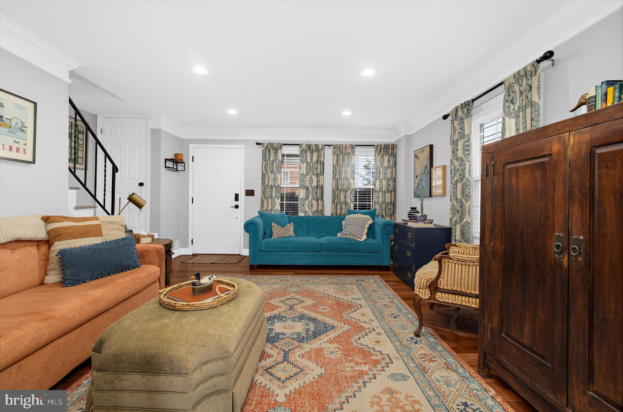 1215 Roland Heights Avenue Baltimore, MD 21211 - Photo 7 of 38 a living room with furniture and wooden floor