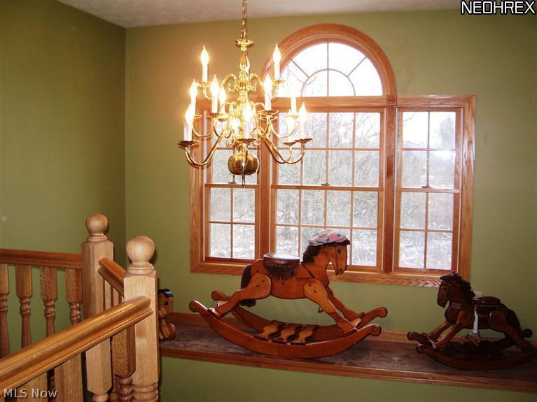 3520 Vandemark Road Litchfield, OH 44253 - Photo 10 of 25 3520 Vandemark, Litchfield, OH Display shelf above foyer (view from second floor landing)