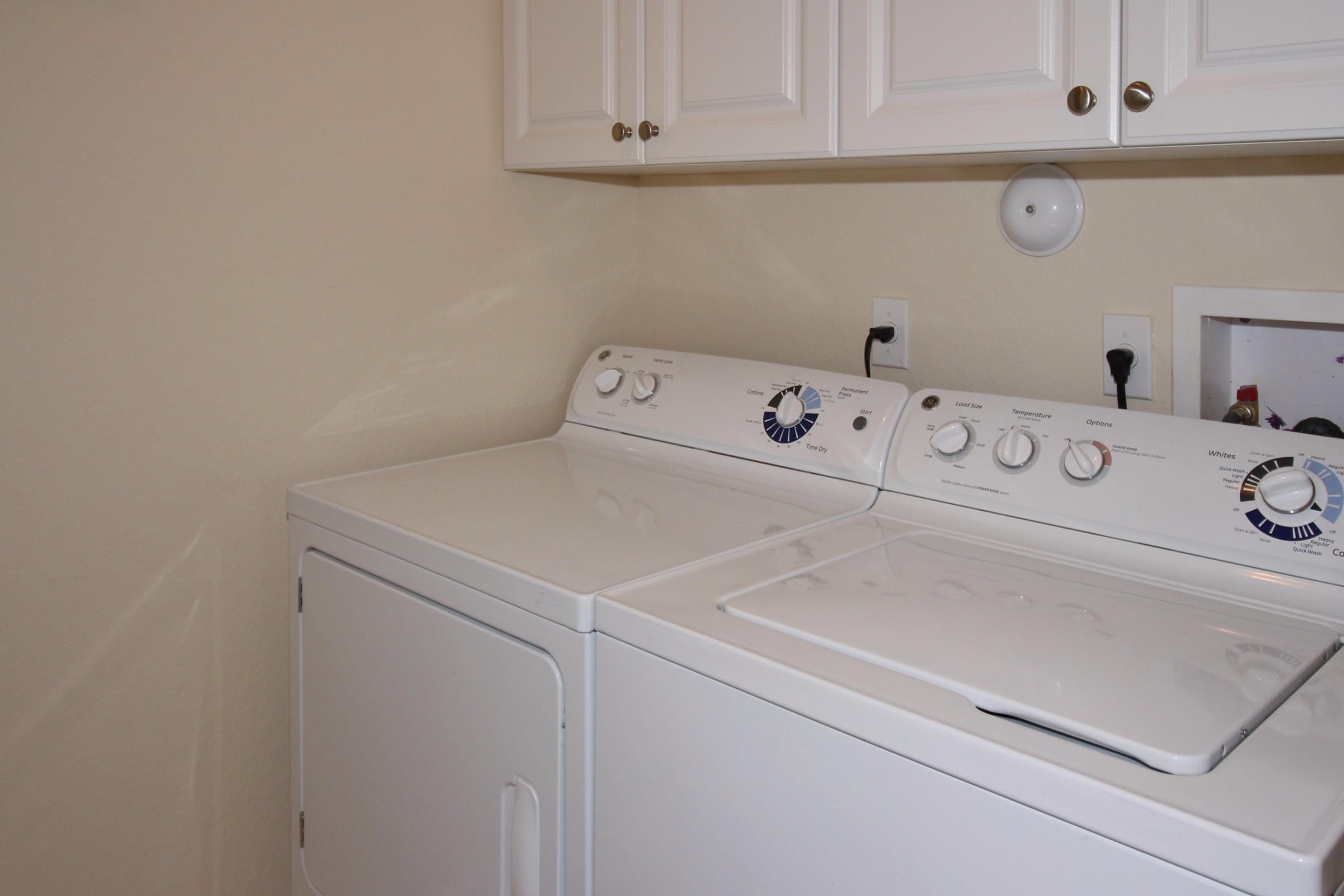 145 Northwest Emerson Place Boca Raton, FL 33432 - Photo 26 of 35 a utility room with dryer and washer