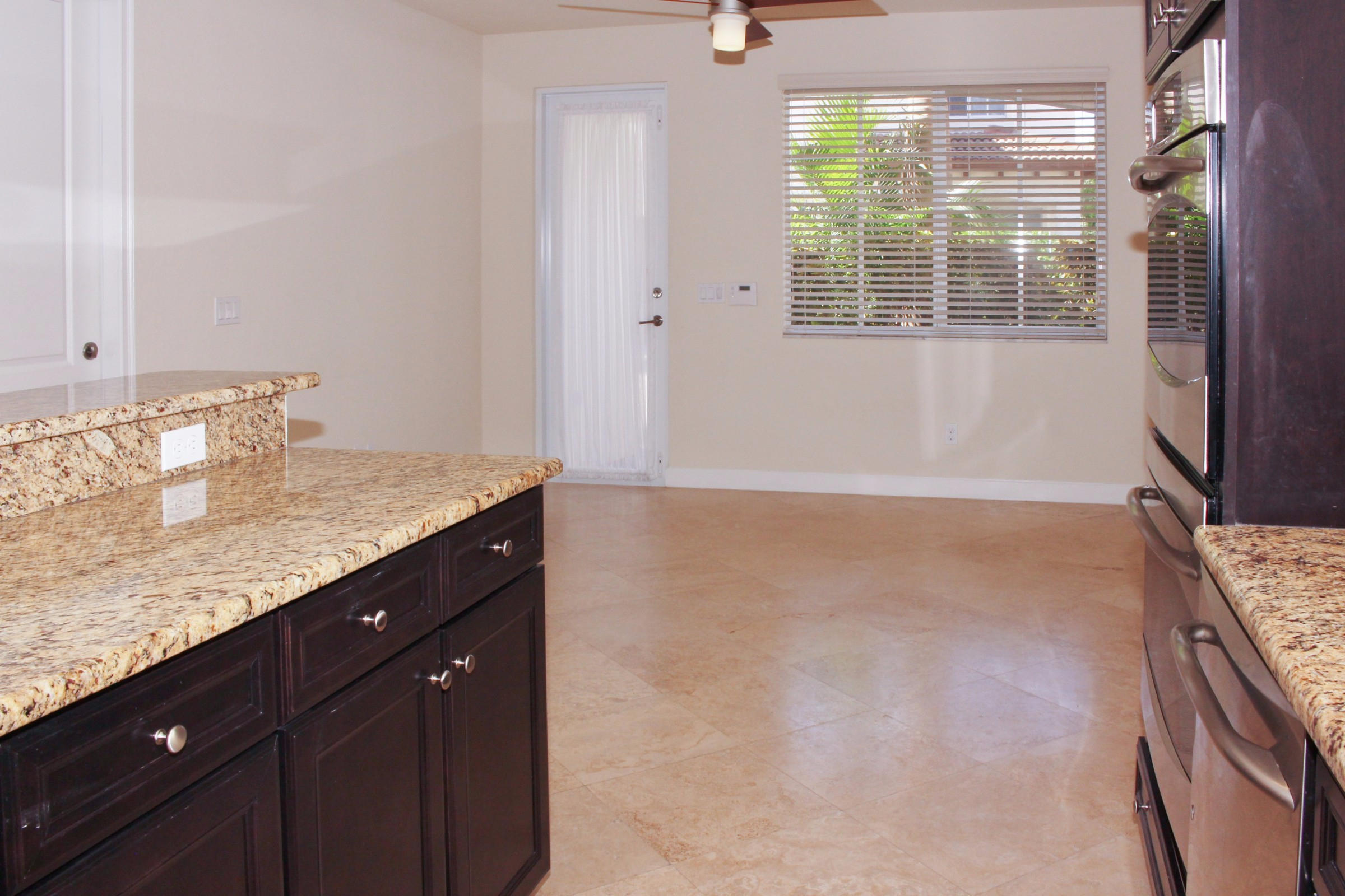 145 Northwest Emerson Place Boca Raton, FL 33432 - Photo 6 of 35 a bathroom with a granite countertop sink and shower