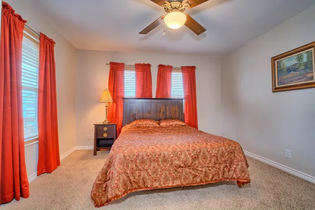 a kitchen with stainless steel appliances granite countertop a stove and a microwave