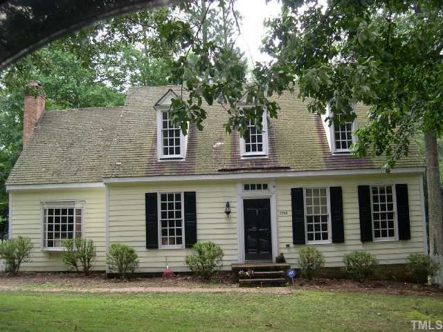 3748 Lassiter Mill Road Raleigh, NC 27609 - Photo 1 of 3 front view of a house with a yard