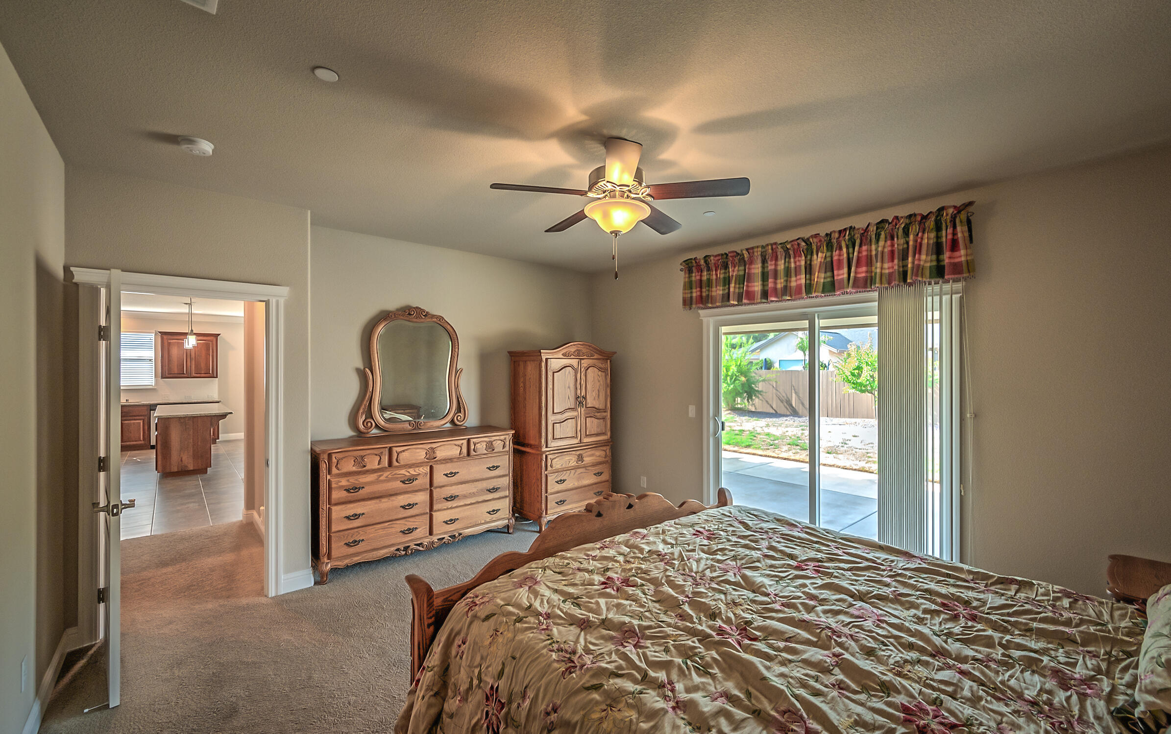 3375 Hotlam Road Redding, CA 96002 - Photo 11 of 38 a bedroom with a bed dresser and a window