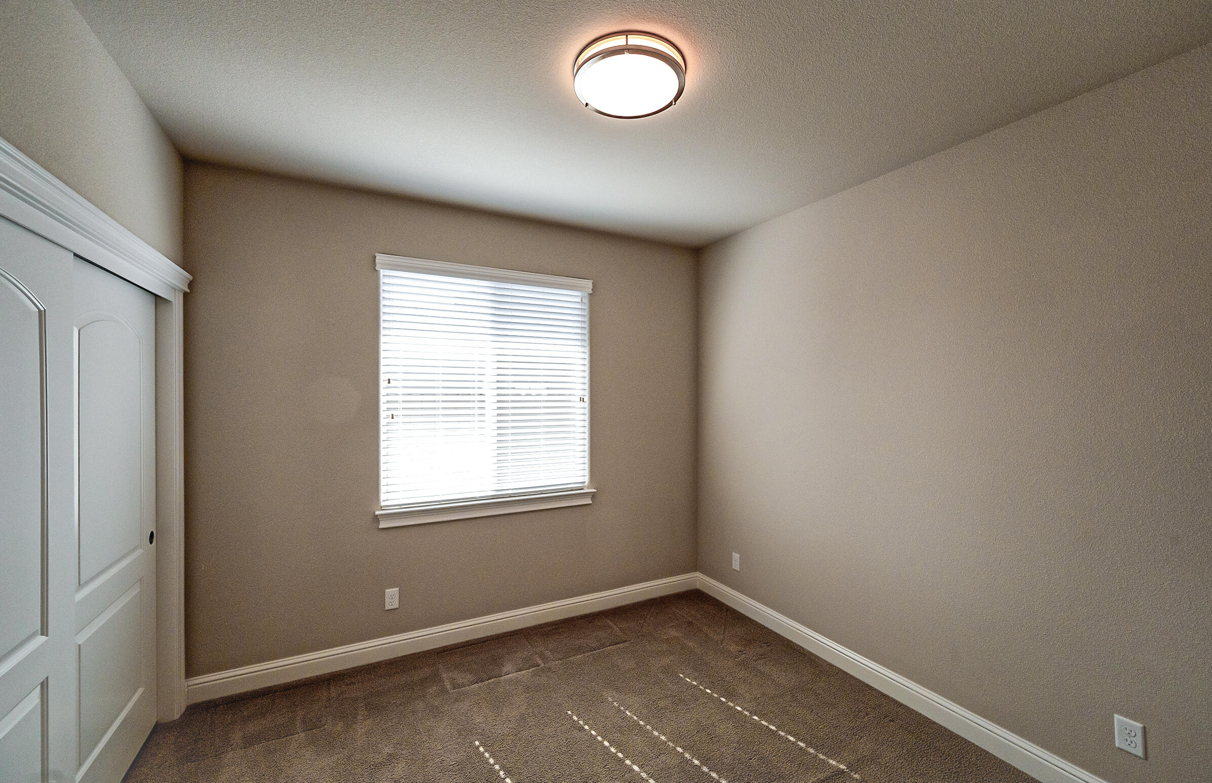 3375 Hotlam Road Redding, CA 96002 - Photo 20 of 38 an empty room with a window