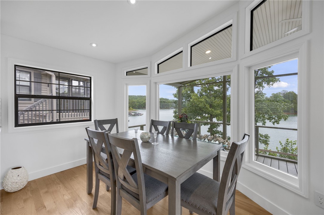 1230 Melton Road, Unit 30 West Union, SC 29696 - Photo 11 of 42 A spacious dining area features abundant natural light and serene lake views.