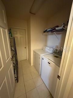 1527 Northeast 40th Place Gainesville, FL 32609 - Photo 17 of 19 a view of a storage and utility room with a sink