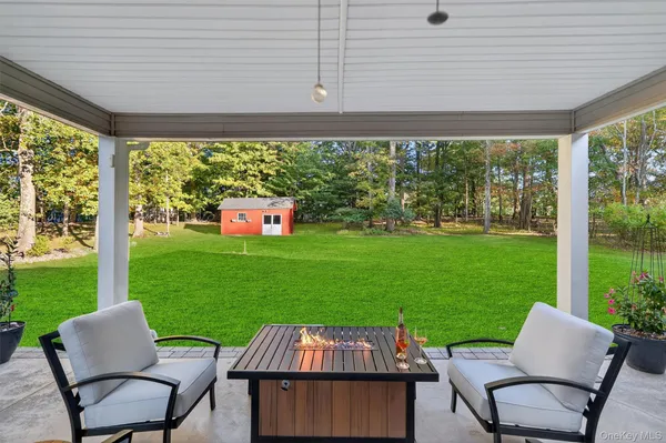 a view of yard with seating area