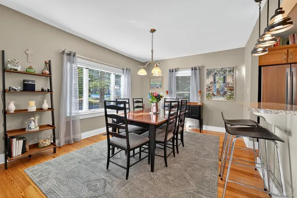 a view of a dining room with furniture