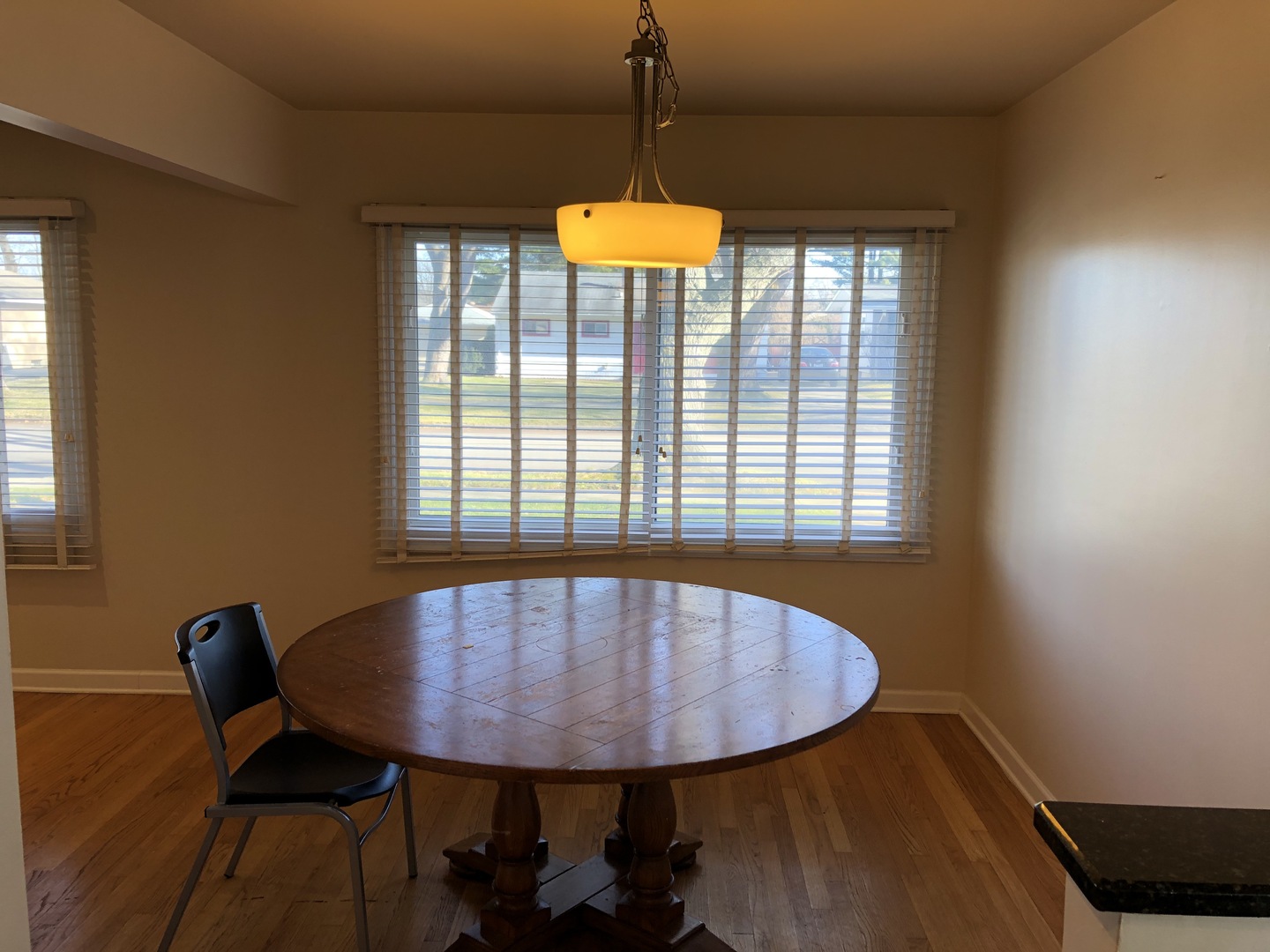 1674 Maple Street Des Plaines, IL 60018 - Photo 6 of 28 a view of a dining room with furniture and window