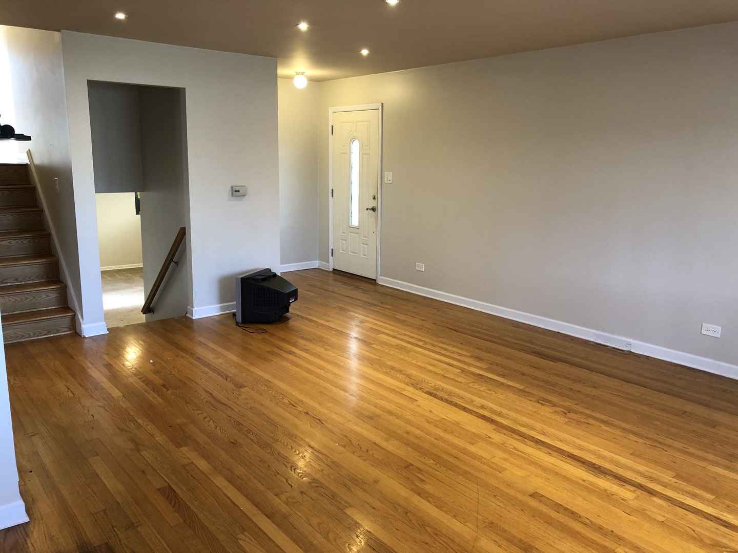 1674 Maple Street Des Plaines, IL 60018 - Photo 9 of 28 a view of room with window and wooden floor