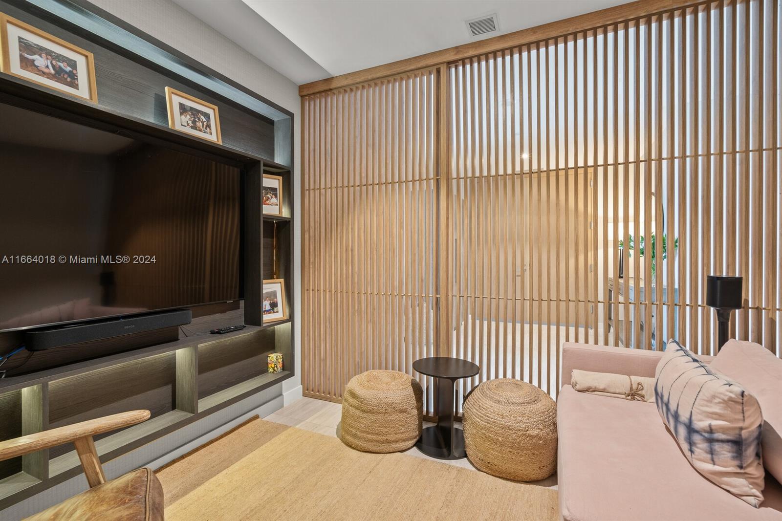 18975 Collins Avenue, Unit 5002 Sunny Isles Beach, FL 33160 - Photo 30 of 37 a living room with furniture