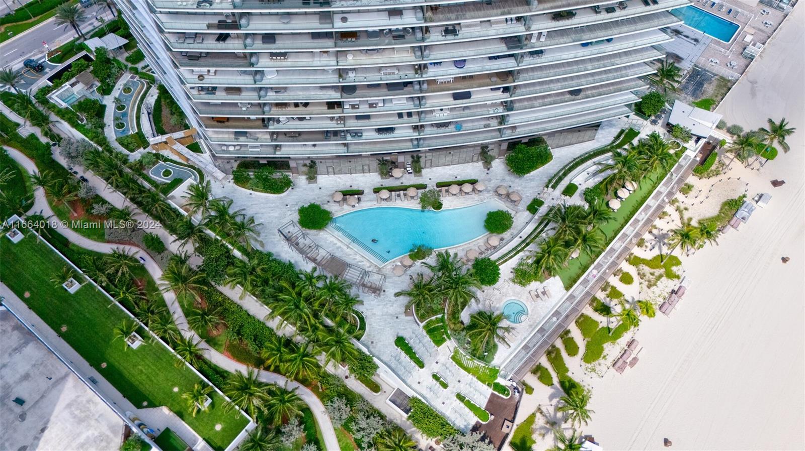 18975 Collins Avenue, Unit 5002 Sunny Isles Beach, FL 33160 - Photo 34 of 37 a view of a garden with plants