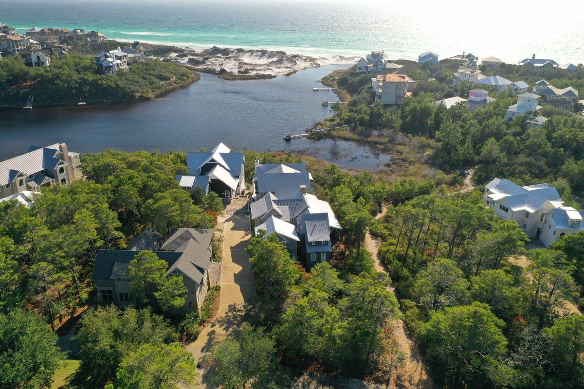 Lot 6 Cedar Fork Road Santa Rosa Beach, FL 32459 - Photo 1 of 18 an aerial view of a house with a lake view