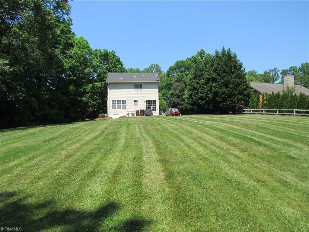 8207 Daltonshire Drive Oak Ridge, NC 27310 - Photo 7 of 30 Gallery Image 7