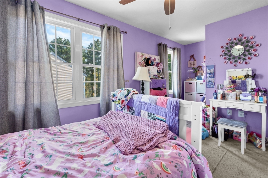 41 Boston Road, Unit 464 Billerica, MA 01862 - Photo 12 of 15 a bedroom with a bed and a dresser